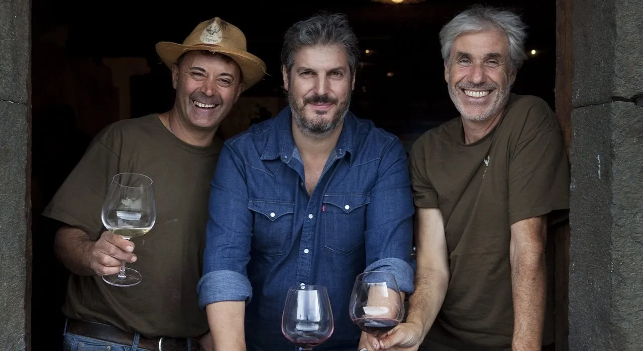 Federico Graziani with his team at the cellar door on Etna